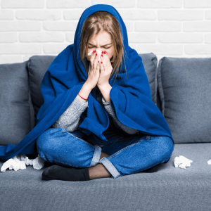 The common cold is a contagious viral infection that primarily affects the upper respiratory tract, including the nose and throat.